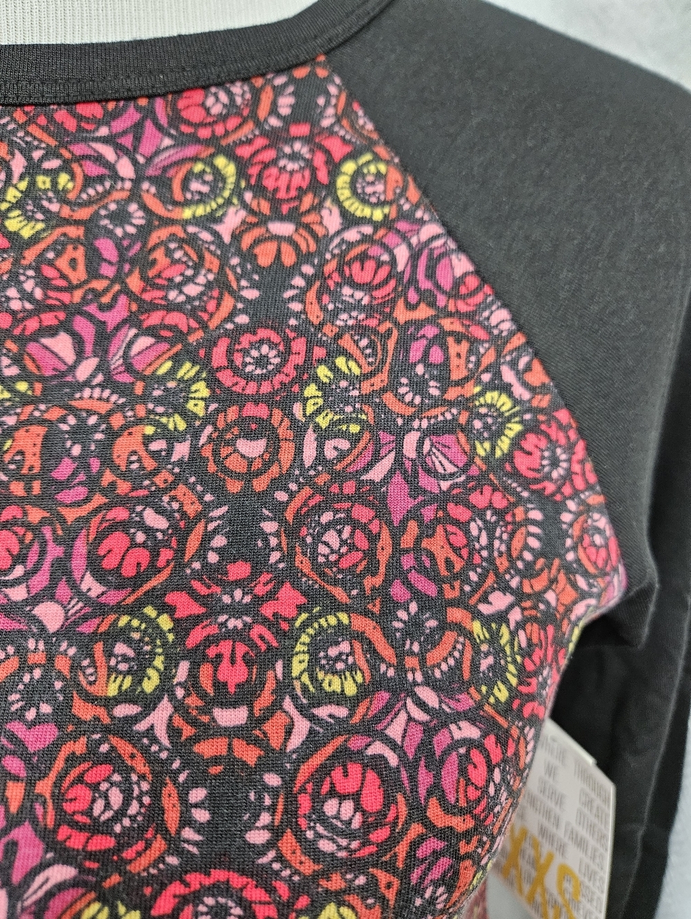 LuLaRoe XXS Randy T Black Top with Red, Pink & Yellow Floral Swirls - Picture 2 of 7